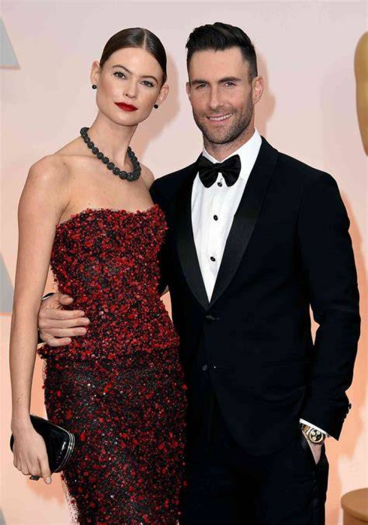 Adam Levine and Behati Prinsloo display their incredible beach bodies