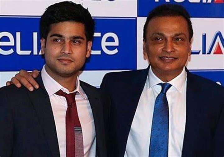 Akash Acharya with his father and mother