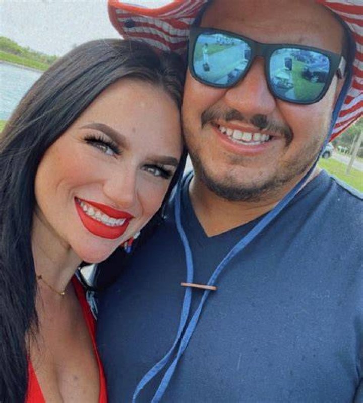 Alexandrea Garza with her husband and son