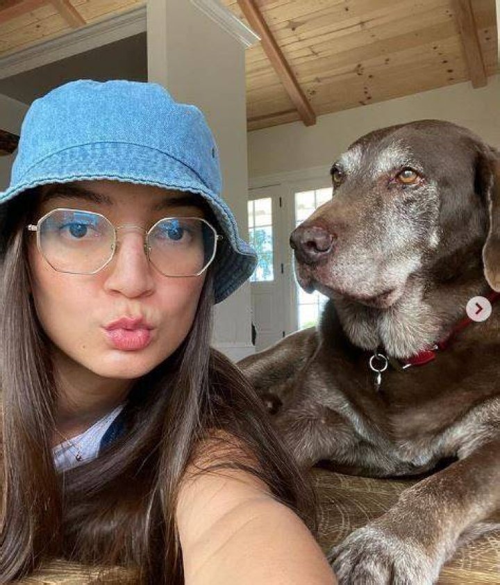Emily Mariko with her pet dog