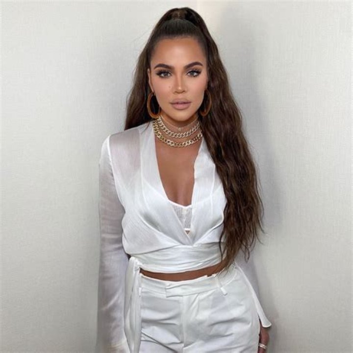 Glowing! Khloe Kardashian Stuns in an All-White Look With Long Brown Hair