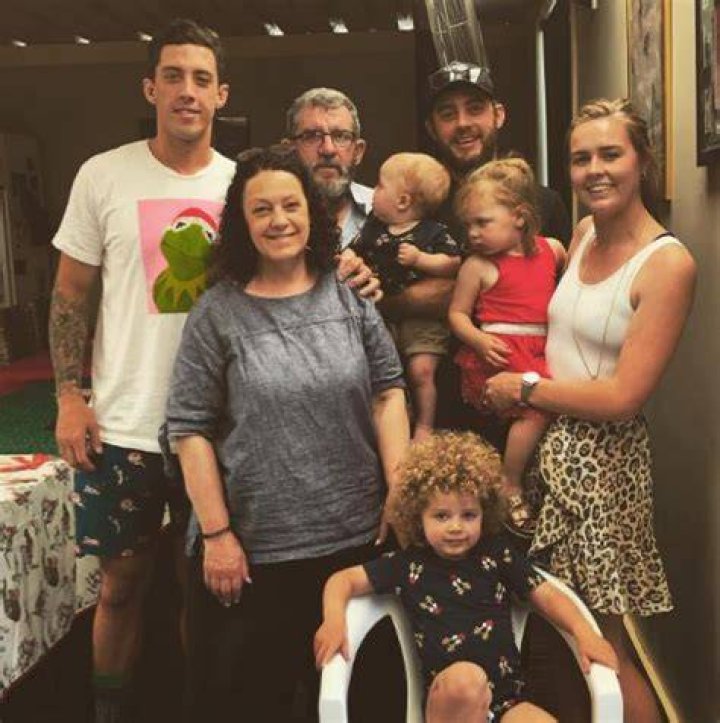 Jordy Sandy with family members