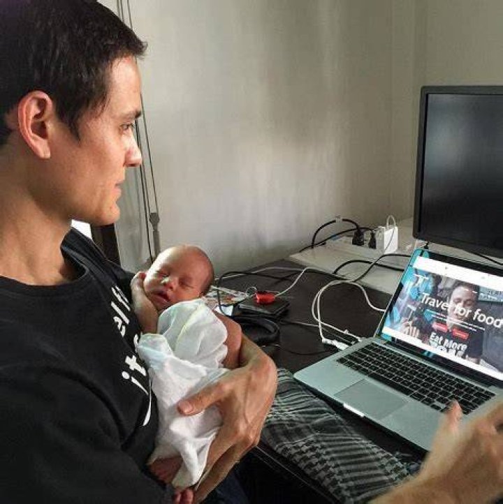 Mark Wiens with baby son Micah Wiens