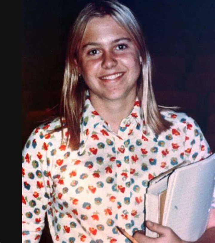 Martha Moxley Holding Books