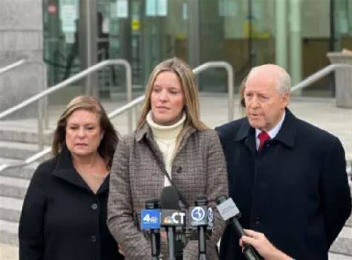 Michelle Troconis and her parents