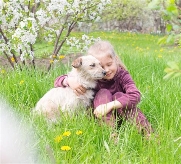 Milana with her pet dog