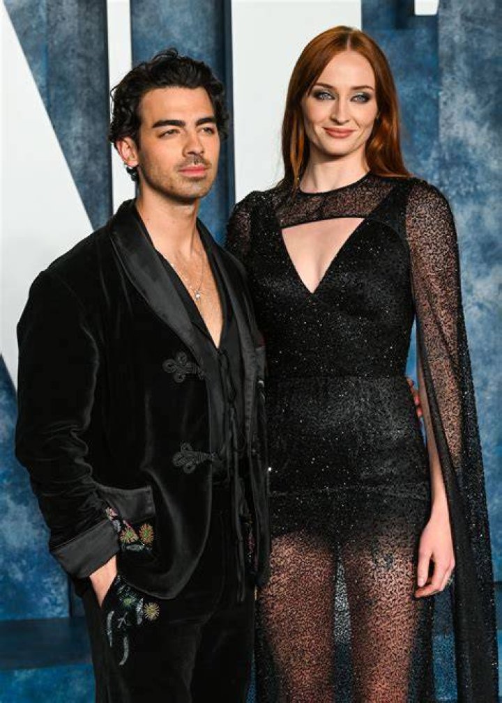 Sophie Turner and Joe Jonas Adjusting Well With Daughter Willa Sophie Wears metallic Low Cut Dress With Joe in White Tux